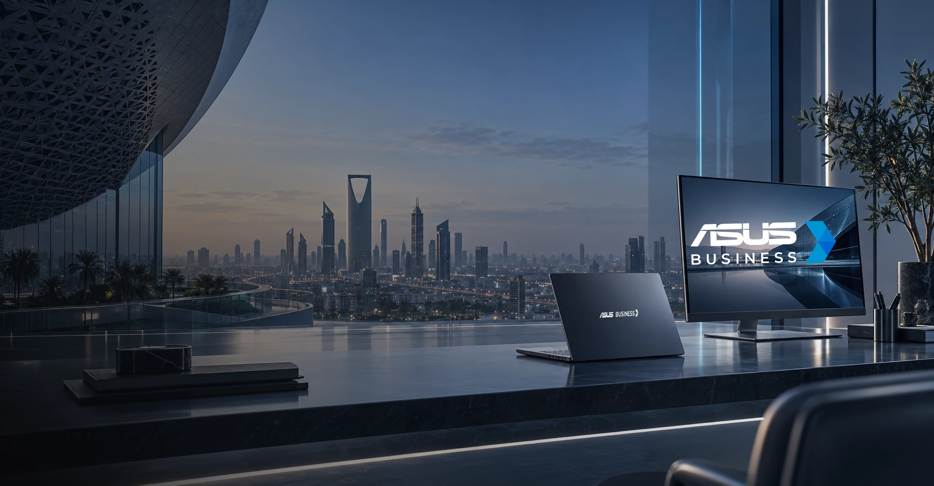 ASUS Business laptop and display in a modern Riyadh office overlooking the Saudi Arabia skyline